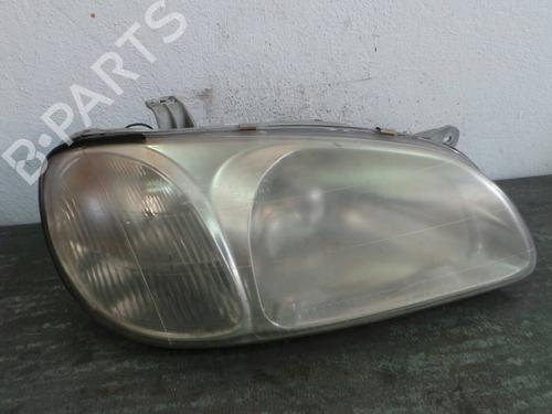 Right headlight KIA CARNIVAL I (UP, FL) 2.9 TDi BP1282607C29