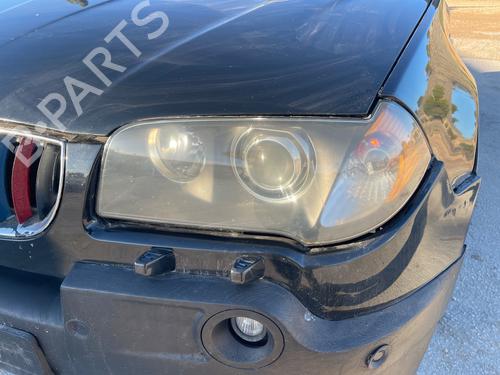 Lyskaster venstre BMW X3 (E83) 3.0 i xDrive (231 hp) 31118045