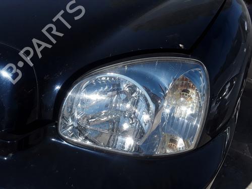 Used Left headlight HYUNDAI SANTA FÉ I (SM) 2.0 CRDi (113 hp) 12540569