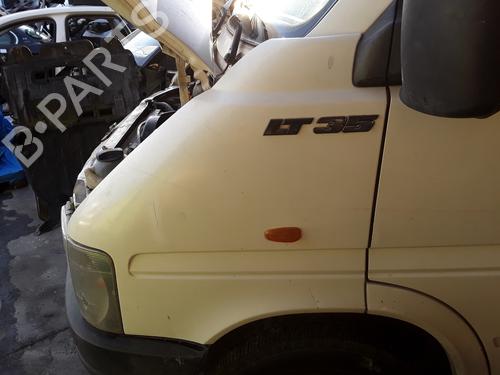 Używane Błotnik przedni lewy VW LT 28-46 II Van (2DA, 2DD, 2DH) 2.5 TDI (102 hp) 16670572