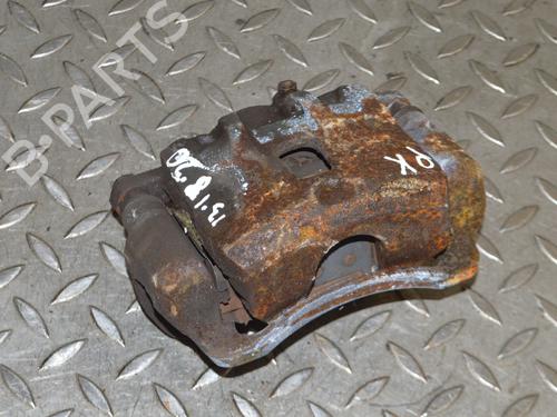 Used Left front brake caliper SSANGYONG TIVOLI 1.6 (126 hp) 27822173
