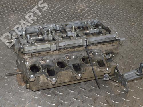 Used Cylinder head VW PASSAT B6 (3C2) 2.0 TDI (136 hp) 9171429