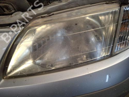 Used Left headlight MAZDA PREMACY (CP) 1.9 (CP10P) (114 hp) 29308882