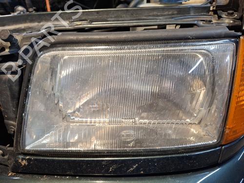 Used Left headlight AUDI 100 C4 Saloon (4A2) 2.3 E (133 hp) 32381769