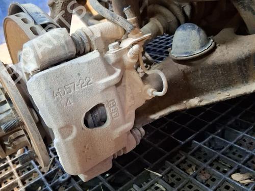 Used Left front brake caliper MITSUBISHI PAJERO I (L04_G, L14_G) 2.5 TD (L044G, L049G) (95 hp) 28387716