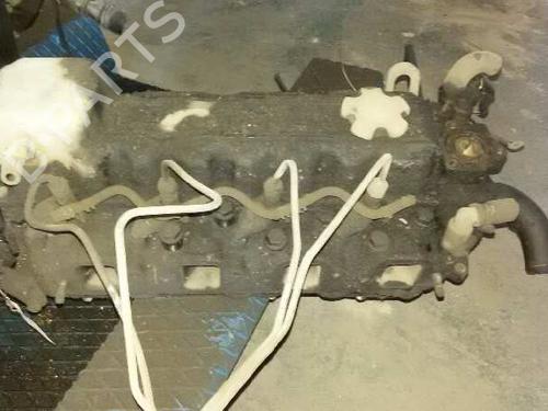 Used Cylinder head NISSAN CABSTAR E (TL_, VL_) [1992-2006]  10979644