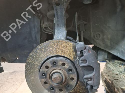 Used Left front steering knuckle VW PASSAT B5 (3B2) 1.9 TDI (110 hp) 30703955