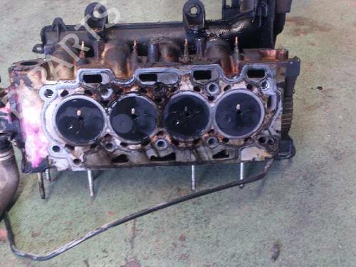 Used Cylinder head FORD FIESTA V (JH_, JD_) 1.4 TDCi (68 hp) 10979663
