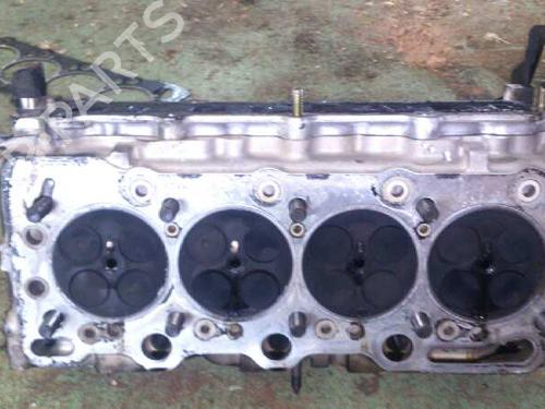 Used Cylinder head OPEL CORSA C (X01) [2000-2009]  10979667