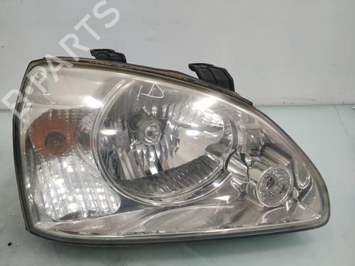 Used Right headlight KIA CARENS II MPV (FJ) 2.0 CRDi (113 hp) 10032597