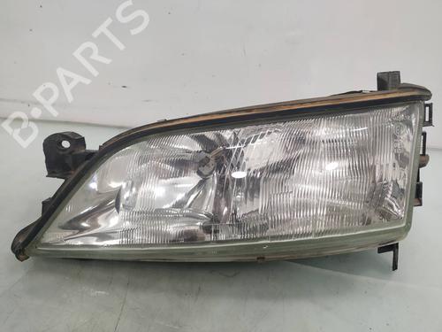 Used Left headlight OPEL VECTRA B (J96) 1.6 i 16V (F19) (100 hp) 10031156
