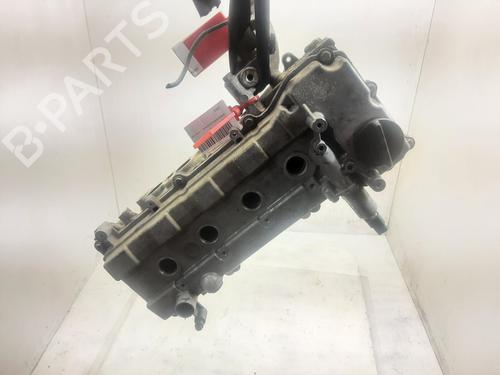 Used Cylinder head NISSAN MICRA III (K12) 1.2 16V (80 hp) 28588771