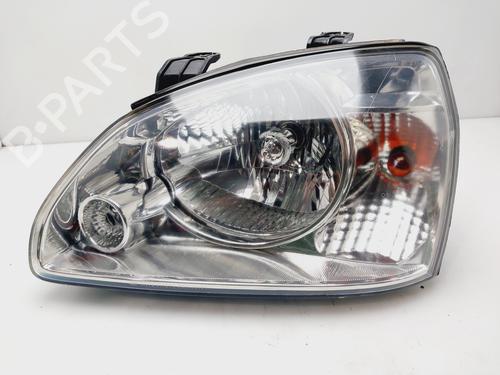 Used Left headlight KIA CARENS II MPV (FJ) 2.0 CRDi (113 hp) 21043348