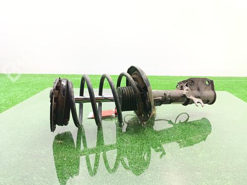 Used Left front shock absorber RENAULT GRAND SCÉNIC III (JZ0/1_) [2009-2016]  27674993