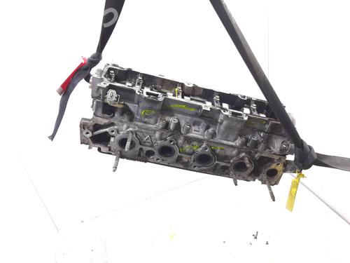 Used Cylinder head FORD FIESTA V (JH_, JD_) 1.4 TDCi (68 hp) 12421767