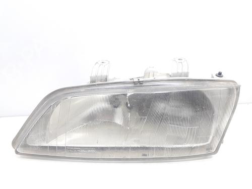 Used Left headlight NISSAN PRIMERA (P11) 2.0 TD (90 hp) 10359069