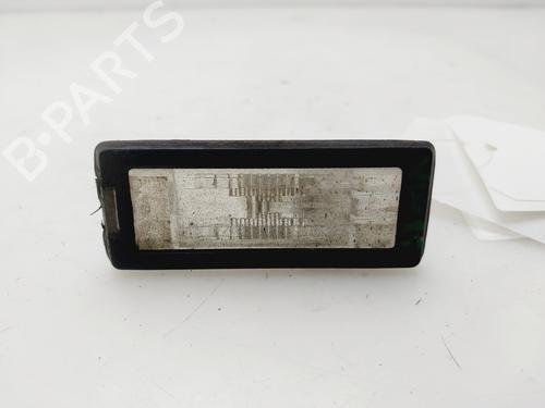 Używane Lampa oświetlenia tablicy rejestracyjnej RENAULT GRAND SCÉNIC II (JM0/1_) 1.5 dCi (JM1E) (106 hp) 30407939