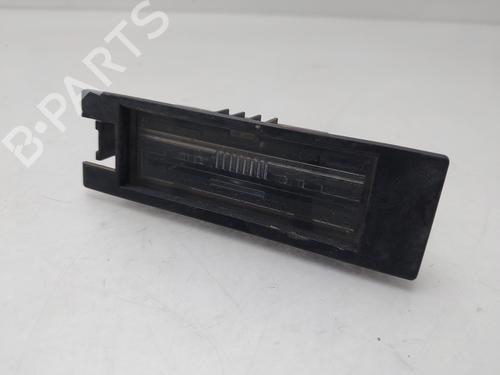 Éclairage de plaque d'immatriculation OPEL CORSA D (S07) 1.2 (L08, L68) (80 hp) 33119115