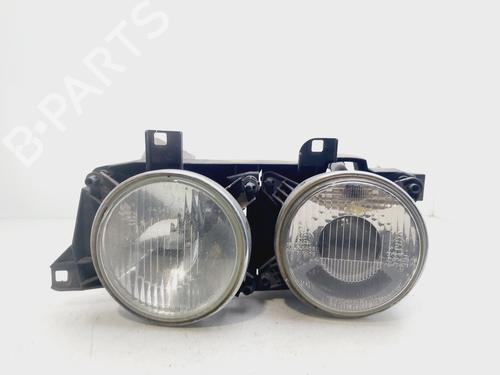 Used Left headlight BMW 5 (E34) 525 tds (143 hp) 26004602