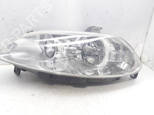 Used Left headlight FIAT CROMA (194_) 1.9 D Multijet (194AXC1B, 194AXC12) (150 hp) 12408266