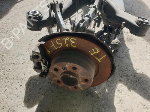 Used Left rear steering knuckle BMW 1 (F20) 118 d (150 hp) 25610168
