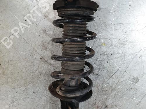 Used Left front shock absorber VW PASSAT B7 (362) 1.6 TDI (105 hp) 12054597