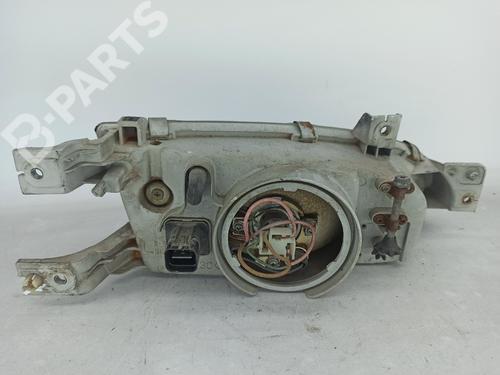 Left headlight HYUNDAI ACCENT I (X-3) 1.3 i 12V | BP10750279C28