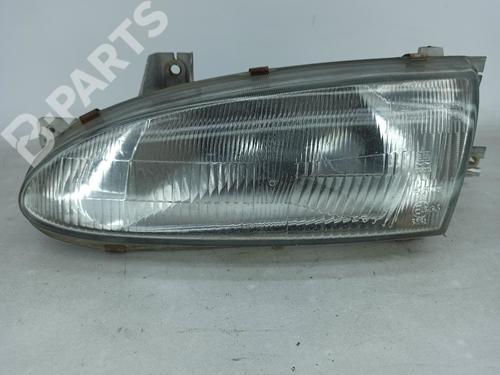 Used Left headlight HYUNDAI ACCENT I (X-3) 1.3 i 12V (84 hp) 10750279