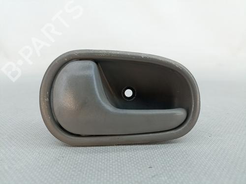 Klamka wewnętrzna drzwi przednich lewych KIA RIO I Hatchback (DC) 1.3 KD06159330