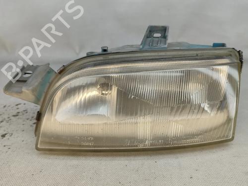 Used Left headlight FIAT PUNTO (176_) 75 1.2 (73 hp) 32385953