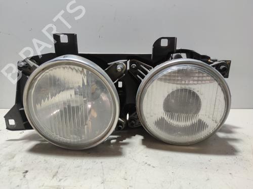 Used Left headlight BMW 5 (E34) 525 tds (143 hp) 13908816