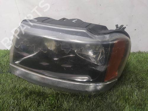 Venstre forlygte JEEP GRAND CHEROKEE II (WJ, WG) 2.7 CRD 4x4 (163 hp) 8704325