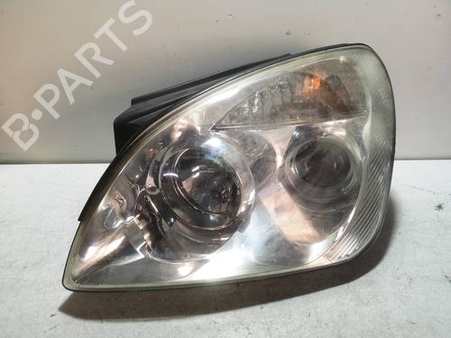 Used Left headlight KIA CARENS II MPV (FJ) 2.0 CRDi (113 hp) 8710306