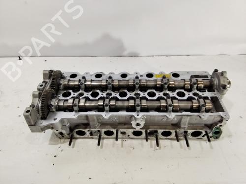 Used Cylinder head VOLVO S60 I (384) D5 (163 hp) 32072364