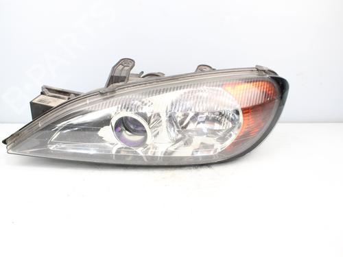 Used Left headlight NISSAN PRIMERA Hatchback (P11) 1.6 16V (106 hp) 16376337