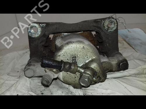 Używane Zacisk hamulca przedniego prawego SUZUKI SWIFT III (MZ, EZ) 1.3 DDiS (RS413D) (69 hp) 29216420