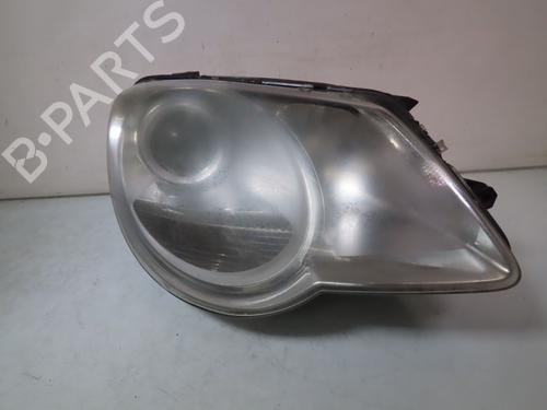Used Right headlight VW EOS (1F7, 1F8) 2.0 TDI (140 hp) 30954529