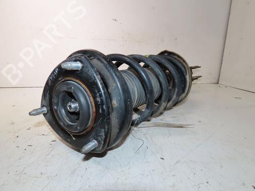 Venstre foran støtdemper SUZUKI GRAND VITARA I (FT, HT) 2.0 4x4 (SQ 420) (140 hp) 30979481