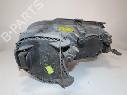 Used Left headlight VW TOURAN (1T1, 1T2) 1.9 TDI (105 hp) 28970100