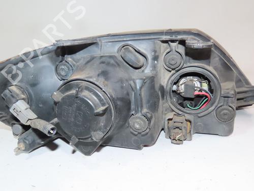 Left headlight HYUNDAI COUPE II (GK) 2.0 GLS | BP28285369C28