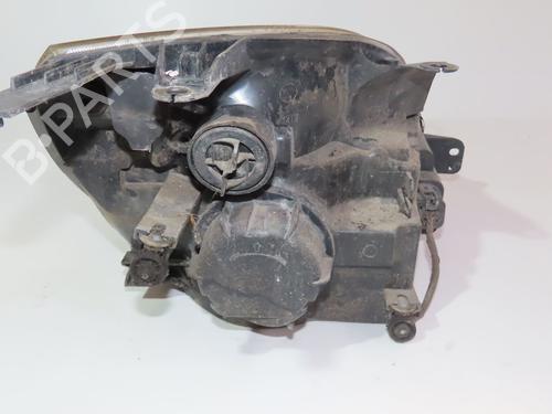 Used Left headlight FORD FIESTA V (JH_, JD_) 1.4 TDCi (68 hp) 24871616