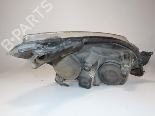 Used Left headlight OPEL ASTRA H GTC (A04) 1.4 (L08) (90 hp) 30606084
