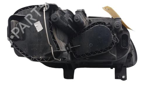 Used Left headlight VW TOURAN (1T1, 1T2) 1.9 TDI (105 hp) 25099811