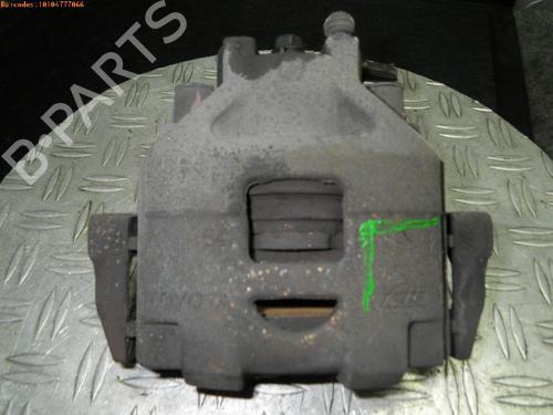 Venstre bremsekaliber foran TOYOTA YARIS (_P9_) 1.3 VVT-i (SCP90_, SCP90R) (87 hp) 14753126