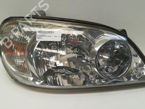 Used Left headlight KIA CARNIVAL II (GQ) 2.9 CRDi (144 hp) 12845107