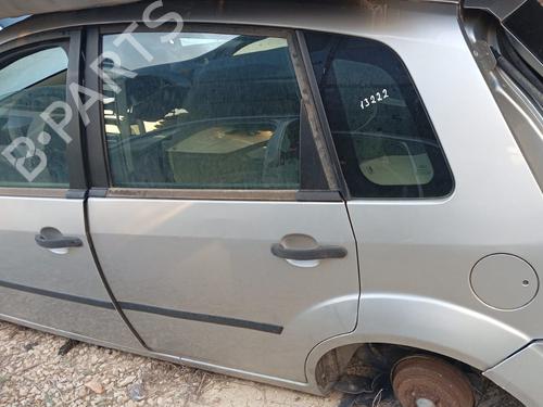 Used Rear left lock FORD FIESTA V (JH_, JD_) 1.4 TDCi (68 hp) 12279975