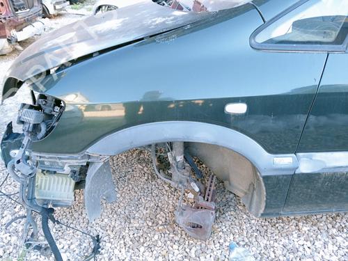Używane Błotnik przedni lewy OPEL ZAFIRA A MPV (T98) 2.0 DTI 16V (F75) (101 hp) 12289486