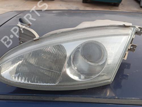 Used Left headlight HYUNDAI COUPE I (RD) 1.6 16V (116 hp) 12287764