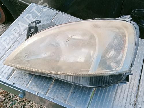 Used Left headlight OPEL COMBO Box Body/MPV 1.3 CDTI 16V (75 hp) 12283981