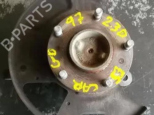 Used Left front steering knuckle NISSAN VANETTE CARGO Bus (HC 23) [1994-2001]  14334835